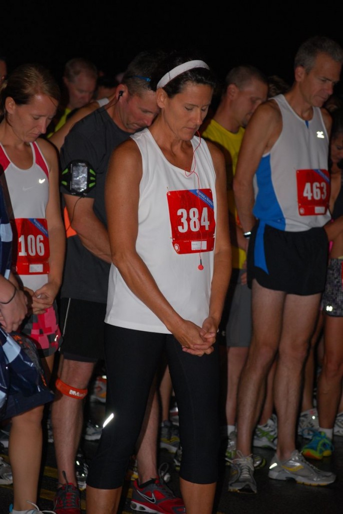 Huntingburg Mayor Denny Spinner gave a prayer before the run. 