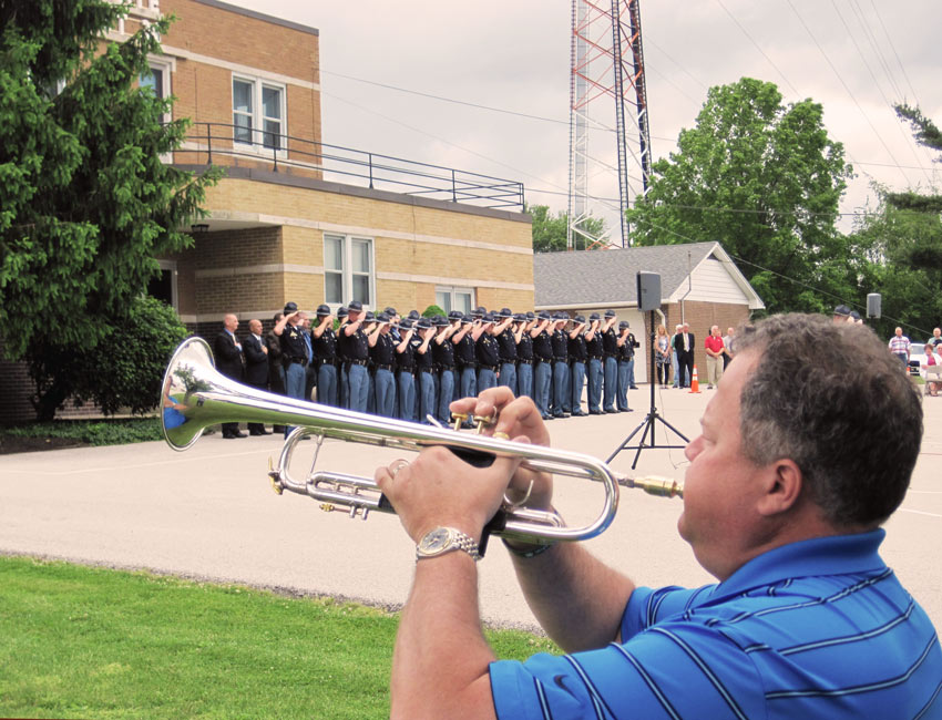 Patrick Keeley, JHS Band Director, played Taps for the recent Indiana State Police Memorial Service.