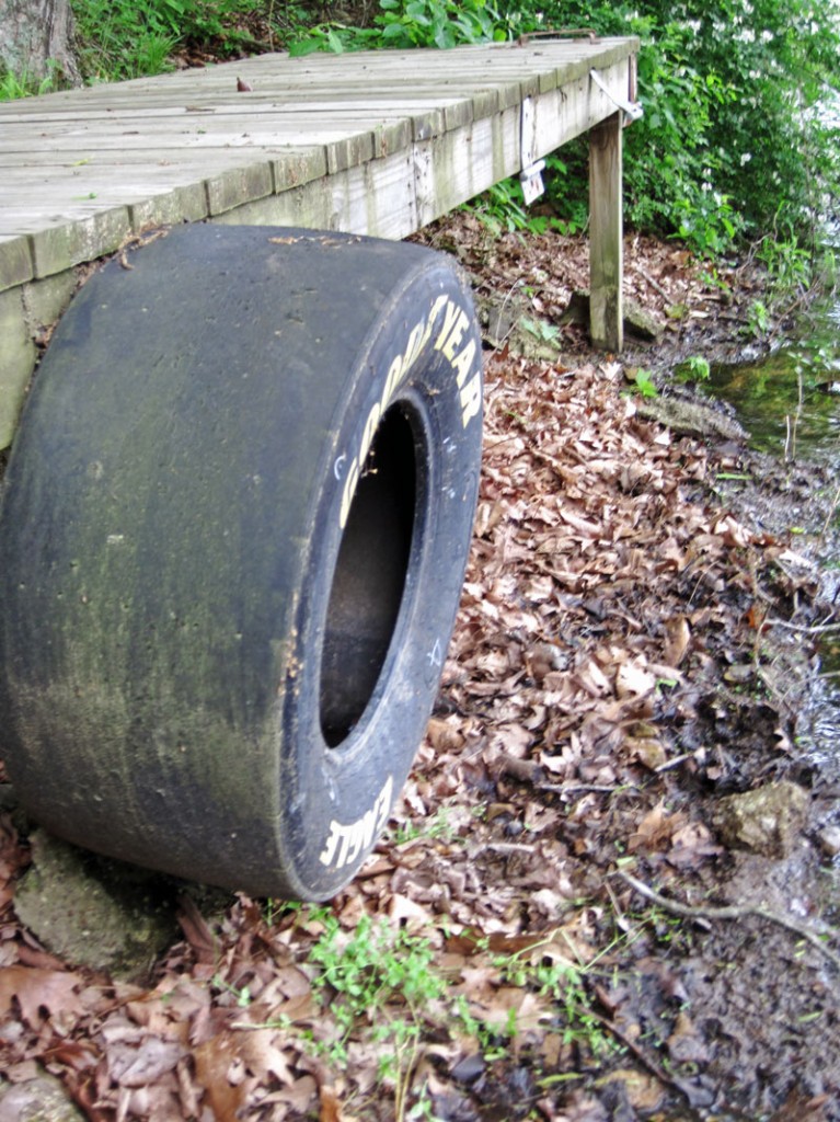 A bumper on a private pier at the lake is now well above the waterline. 