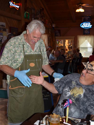 Kerry Hayes purchased butchie's 50,000th steak on Friday, August 16. Photo by Kathy Tretter