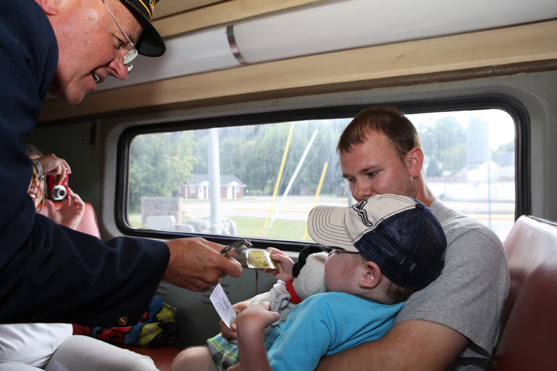 The Conductor and Kaleb Photo courtesy of Center Beam Photography
