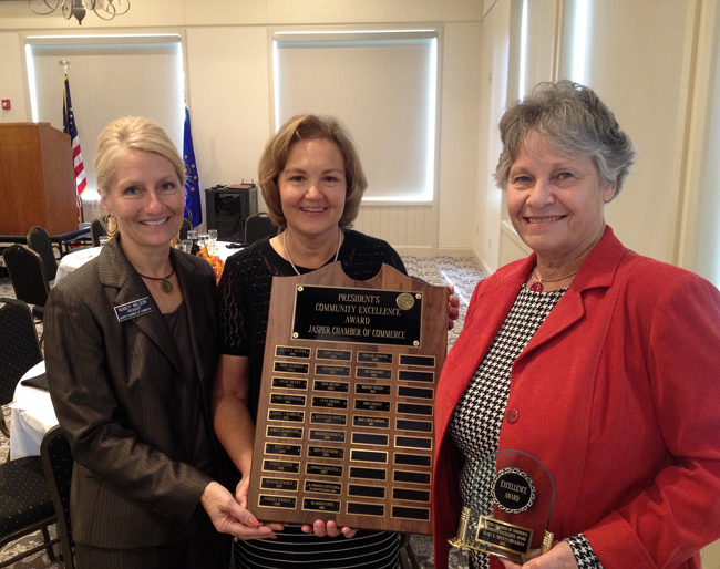 Outgoing Chamber President Nancy Wilson, Chamber Executive Director Nancy Eckerle, and Becky Beckman, 2013 recipient of the President's Community Excellence Award.