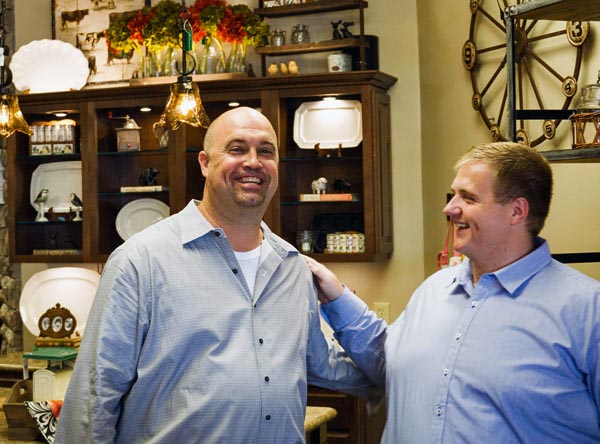 David Fischer (left) opened Komfortabel Haus in the Southgate Shopping Center in Jasper. Tyler Lemen (right), the new assistant principal of Holy Trinity Catholic School is his cousin.