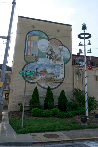 The mural at Newton and Sixth streets is up for a refresh and redesign. Hopefully, it will be revealed at the end of May.