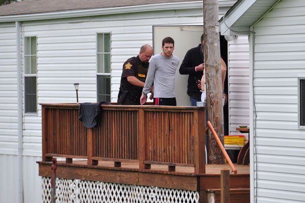 DCSD Officers taking John Bickerest IV into custody in Ferdinand.