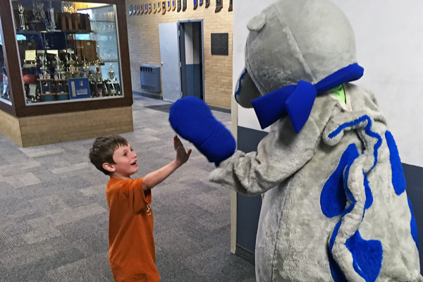 Isaiah Wineinger, 6, a kindergartener at Dubois Elementary, high-fived the Jeep as he entered the Northeast Dubois High School cafeteria Tuesday evening.