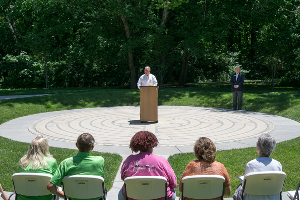 Phil Gramelspacher explained the process that brought the labyrinth to the Riverwalk during the dedication Wednesday. The Jasper Desk 