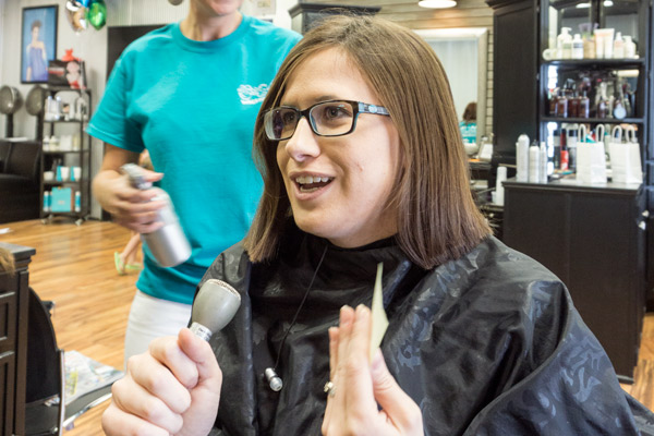 Melanie works at WITZ AM/FM and hosts the annual Wigs for Kids event. This is a photo from 2015 in which Melanie donated her own hair to be used to create wigs for kids fighting cancer.