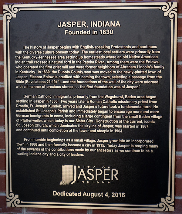The plaque details Jasper's founding and history.