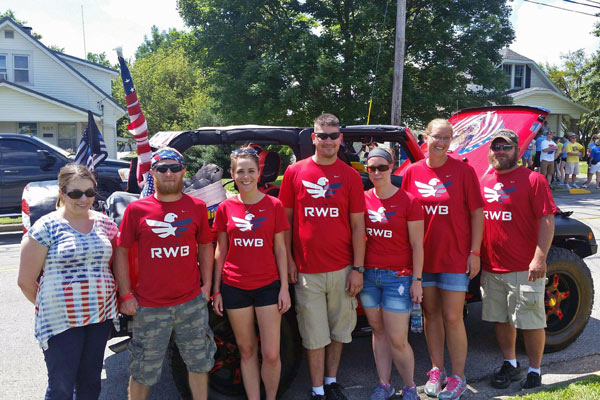 Some members of Team RWB marched in the Strassenfest Parade. From left: Mackenzie James, Eric Evitts, Angie Evitts, Craig Breitweiser, Valerie Lochte-Lange and Josh Lange.