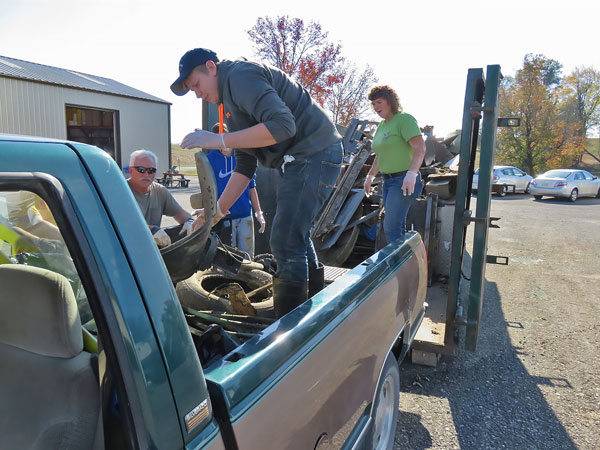 Austin Sunder,Northeast Dubois High School, unloaded some of the 3000 pounds of junk picked up during the Dubois County Creek Sweep