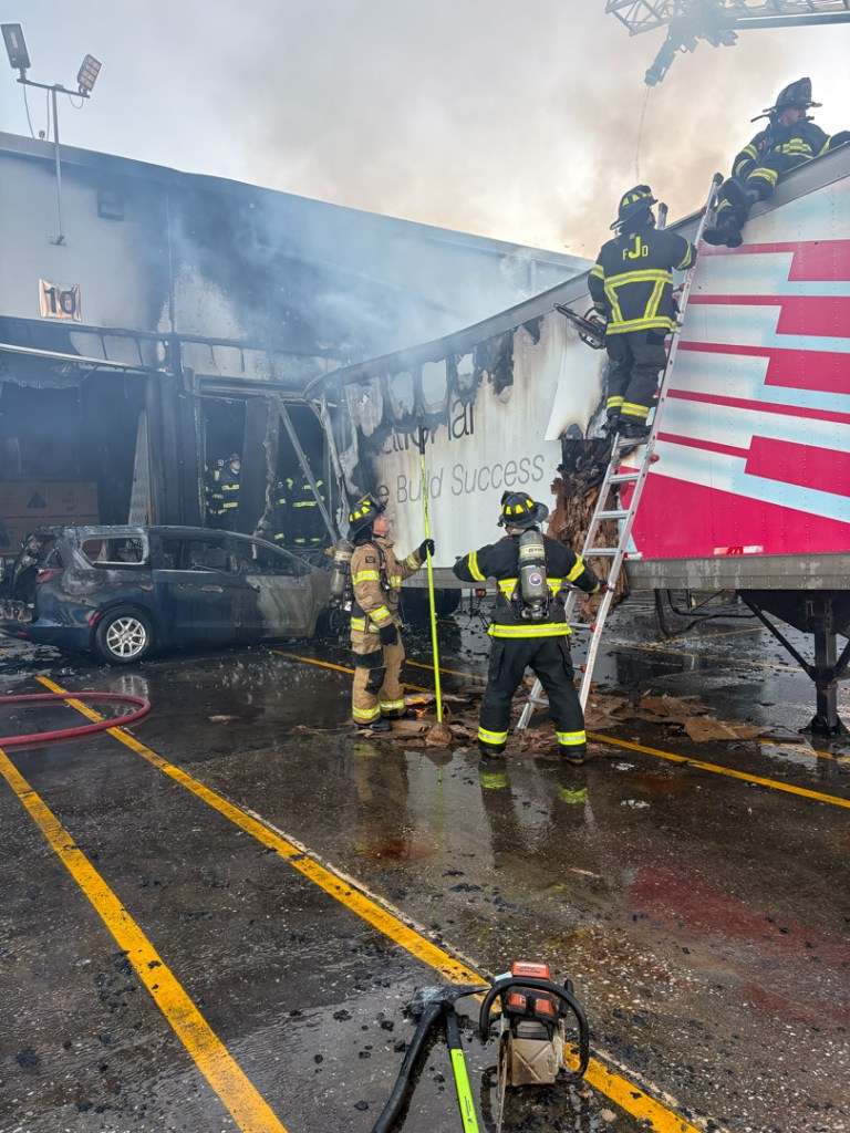 Kimball International building damaged by fire after minivan strikes trailer