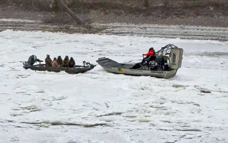 Duck hunters rescued on White River