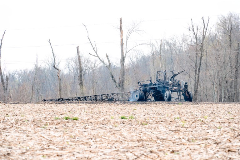 Contact with high voltage line cause of sprayer fire